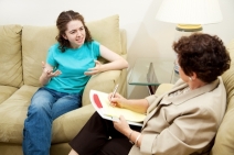 a therapist and a client talking